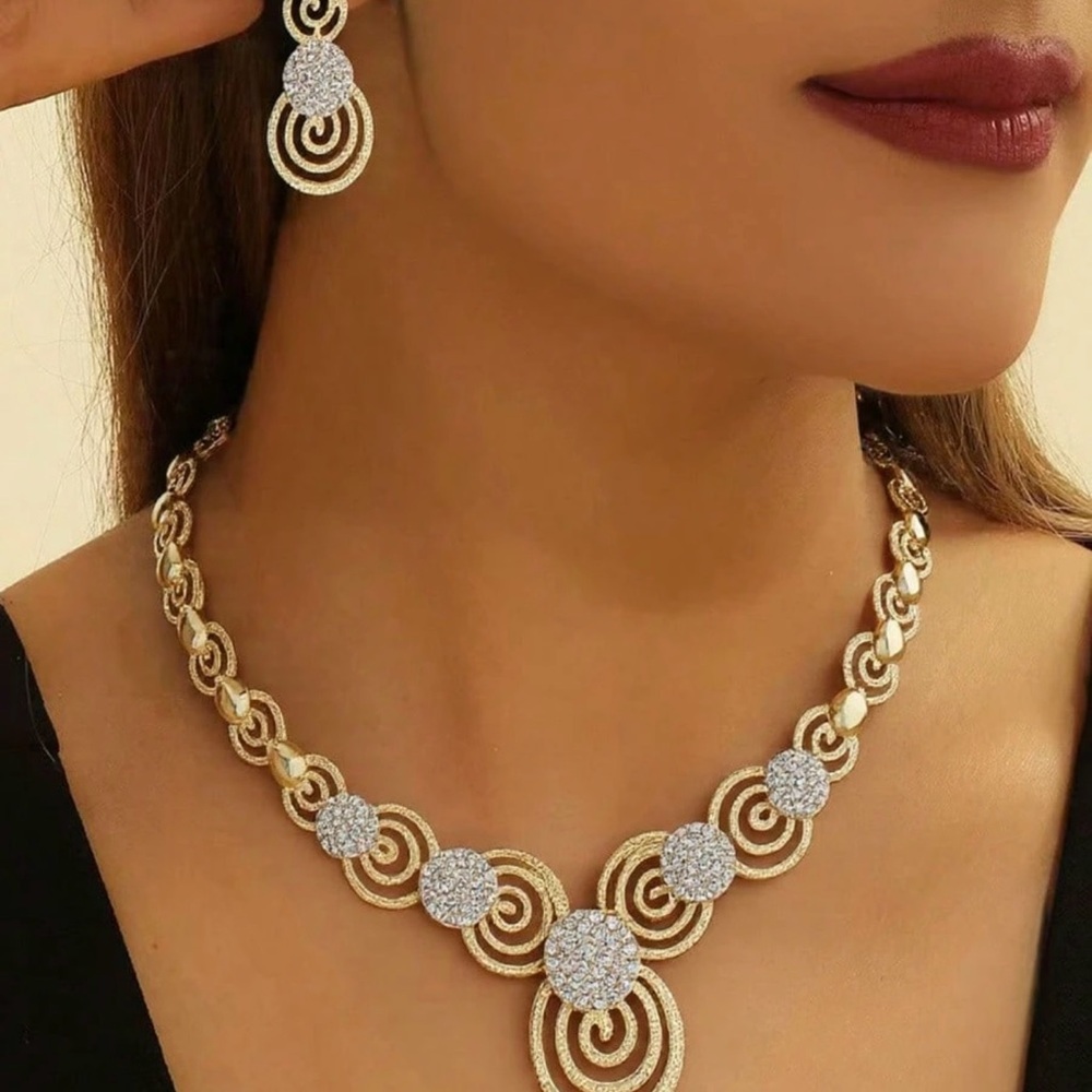 Elegant Gold and Silver Swirl Necklace and Earring Set